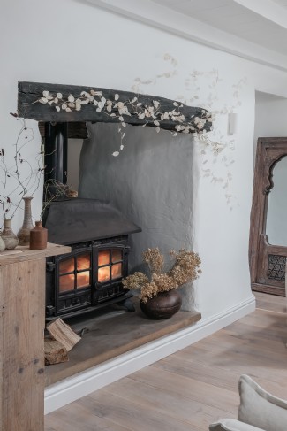 The double-sided fire warms the open-plan living room