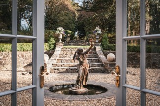 Enjoy the extensive gardens at this Welsh manor house