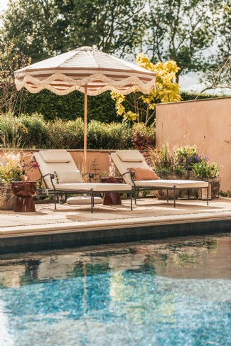 Spend long days on loungers by the swimming pool