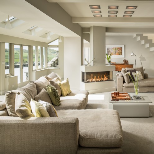 A refined, yet muted and powdery interior in this luxury, open-plan lounge