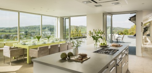 The kitchen-diner flaunts floor to ceiling windows and breathtaking 180° views