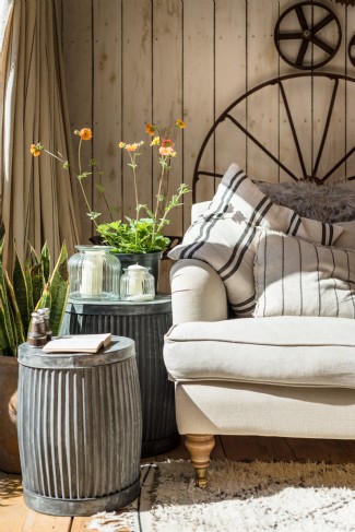Textured rugs and soft linens bring warmth into this luxury cottage in Cornwall