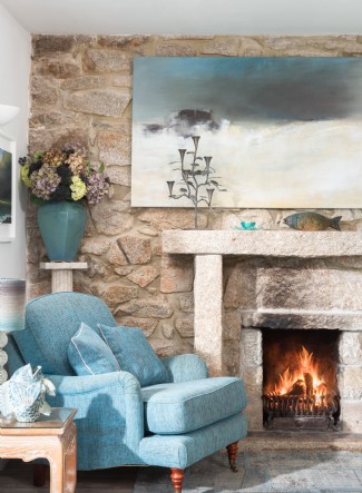 Curl up beside the fire at North Rock Beach House