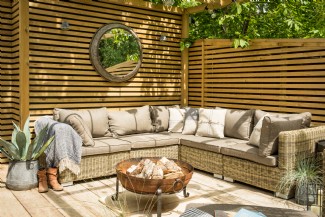 The suntrap garden is complete with a firepit