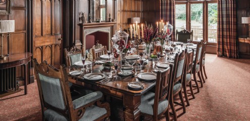 The wood-panelled dining room at Thornemead Castle, Somerset
