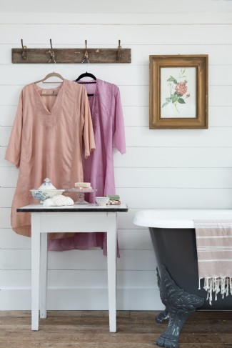 The clawfoot bath in the bedroom