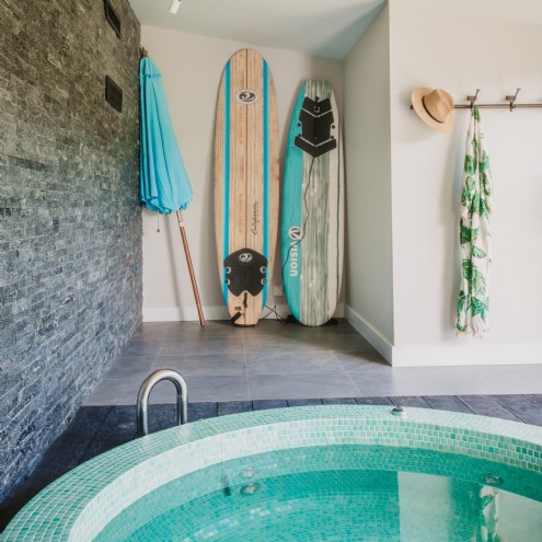 The garden spa room features a hot tub with jets