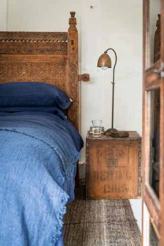Carved Indian wood headboards in Hollyhocks